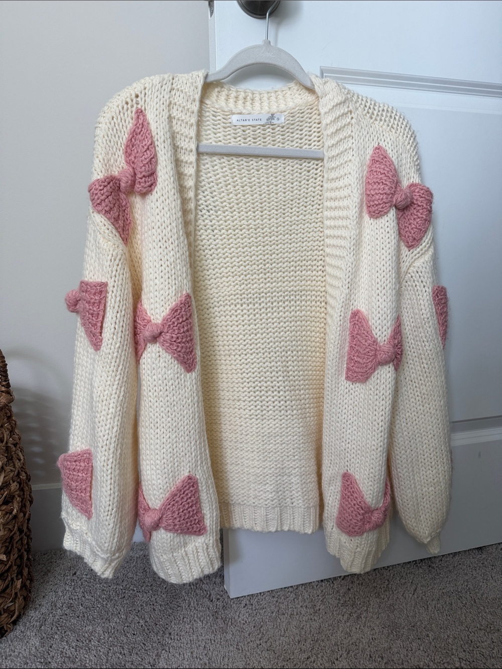 Altar’d State Cream Knit Cardigan with Pink Bow Accents